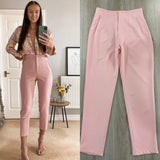 Pantalón a la cintura con pinzas rosa claro
